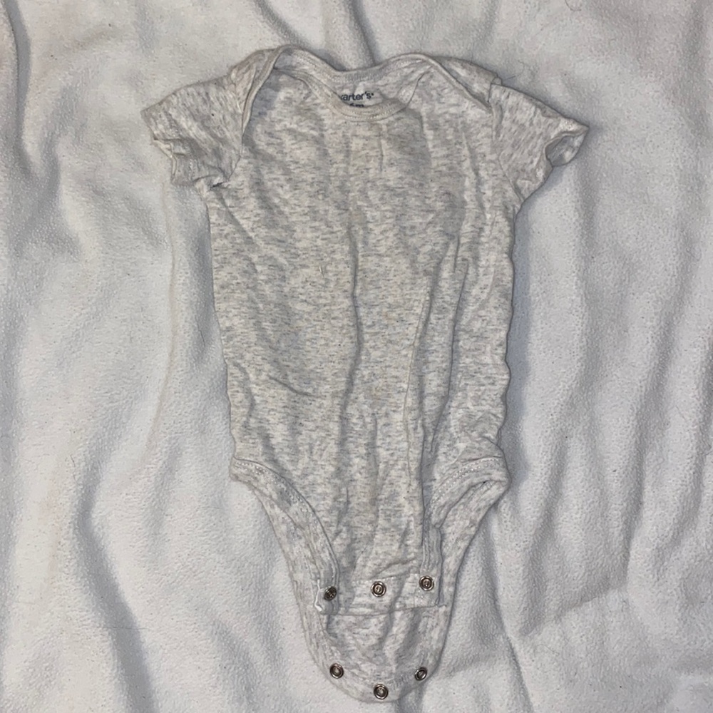 White and grey onesie.